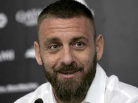 Quand De Rossi se déguise en tifoso pour aller voir le Derby. AFP