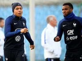 Les Français Kylian Mbappé et Thomas Lemar lors d'un entraînement, le 24 mars à Luxembourg. AFP