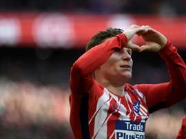Atletico Madrid will not stop in pursuit of Barcelona, promises Gameiro. AFP