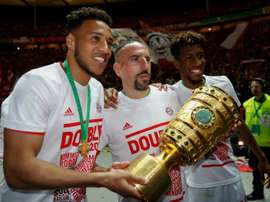 Corentin Tolisso (g) et Franck Ribéry lors de la victoire en Coupe d'Allemagne. AFP
