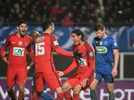 Cavani celebrates his extra-time goal which eases PSG through to next round.