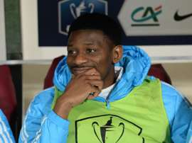 Le milieu de terrain marseillais Abou Diaby sur le banc des remplaçants contre Trélissac. AFP