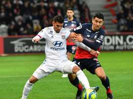 Choc Lille-Lyon au sommet, Paris sans Ney, les fans reconfinés. AFP
