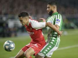 Reguilon (L) has had a great year at Sevilla. AFP