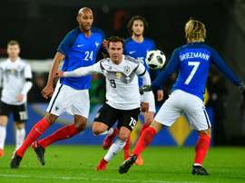 Gotze vies with Steven Nzonzi and Antione Griezman. AFP