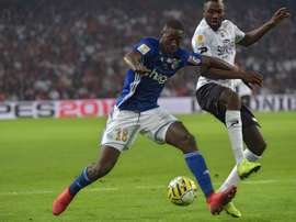 Ibrahima Sissoko (L) could move to Newcastle. AFP