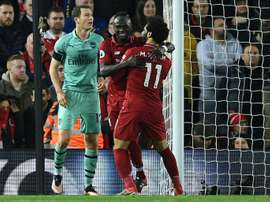 Rooney couvre d'éloges les Reds. AFP