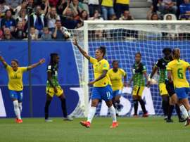 Cristiane marcou os três gols da vitória na estreia. AFP