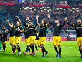Les joueurs de Dortmund jubilent lors de la victoire à Leipzig. AFP