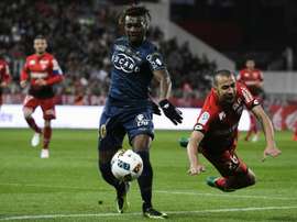 Le milieu de Bastia Allan Saint-Maximin (c) lors du match face à Dijon au stade Gaston-Gérard. AFP