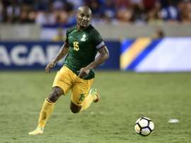 Florent Malouda s'échappe avec le ballon lors du match avec la Guyane française. AFP