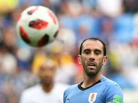 126 sélections pour Godin. AFP