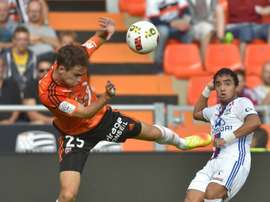 Le défenseur brésilien de Lyon Rafael lors d'un match face à Lorient. AFP