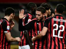 Les joueurs de Milan en liesse lors du but contre son camp du joueur de Sassuolo Lirola. AFP
