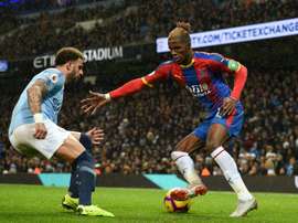 Zaha dans le viseur du PSG. AFP