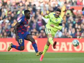 Samuel Umtiti (L) has hardly played recently. AFP