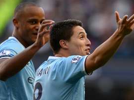 Nasri retrouve Kompany pour une tranche de vie en mauve. AFP
