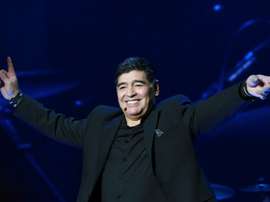 Santa Maradona : la main de Dieu posée sur les guitares. AFP
