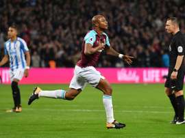 Andre Ayew exulte après avoir inscrit le 2e but de West Ham contre Huddersfield. AFP