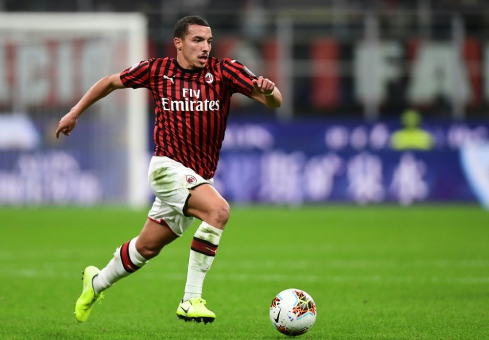 Bennacer is now self-isolating at home. AFP