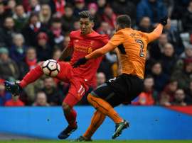 Ni Firmino ni el resto del Liverpool pudieron con los Wolves. AFP