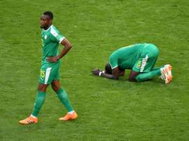 Salif Sane (d) et Diafra Sakho après la défaite contre la Colombie. AFP