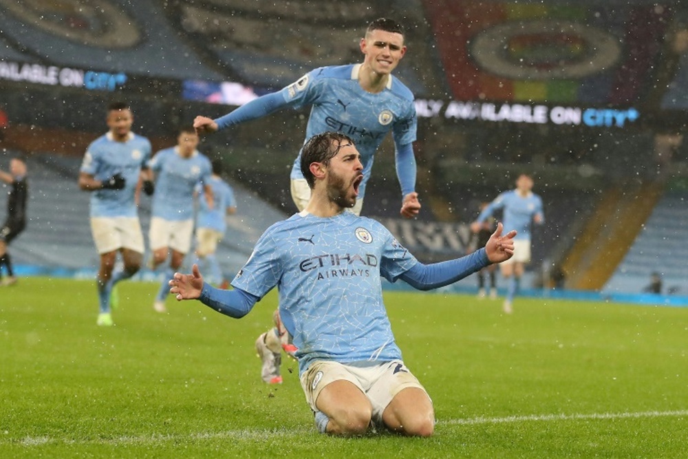 Barca are prioritising sales, Atletico are in pole position for Bernardo Silva. AFP