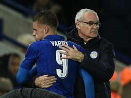 Ranieri embraces Jamie Vardy when leaving the field during a Champions League fixture. AFP