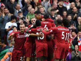 Liverpool players celebrate during victory over Southampton. AFP