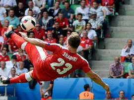 Le milieu suisse Xherdan Shaqiri inscrit un but acrobatique face à la Pologne à l'Euro. AFP