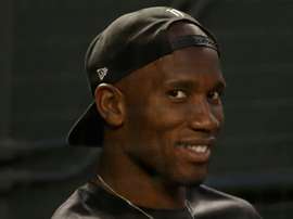 Didier Drogba suit dans les tribunes le match MLB. AFP