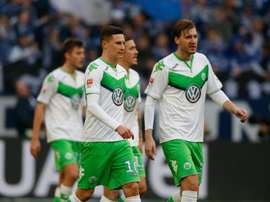 Le Danois Nicklas Bendtner (d), alors attaquant à Wolfsburg, lors du match face à Shalke 04. AFP