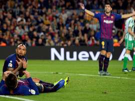 Arturo Vidal and Luis Suarez will not feature against Elche. AFP