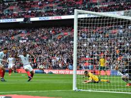 Defoe buteur contre la Lituanie. AFP