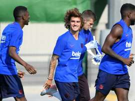 Griezmann confessou que já falou com Suárez mas não com Messi. AFP
