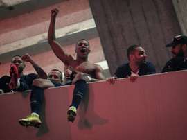 Las celebraciones del pase a cuartos del PSG le han costado una advertencia. AFP/Archivo