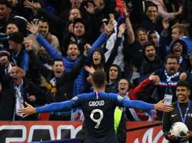 Giroud répond à Benzema. AFP