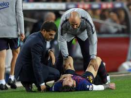 Messi receives treatment. AFP