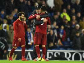 Jurgen Klopp declarou toda sua admiração por Roberto Firmino. AFP