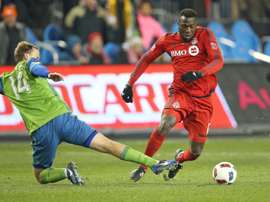 Marshall des Seattle Sounders tente de tacler Jozy Altidore du Toronto FC en finale de la MLS. AFP