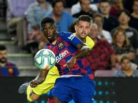 Barcelona can bring in a replacement for Ousmane Dembele (L). AFP