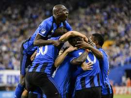 Les joueurs de Montréal se congratulent après un but de Matteo Mancosu contre Toronto. AFP