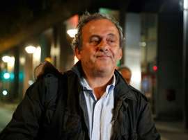 Platini spoke to the press after being released. AFP
