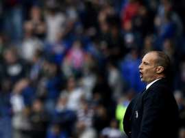 Allegri et deux joueurs proches de Manchester United. EFE