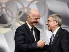 La FIFA salue le report des Jeux Olympiques. AFP