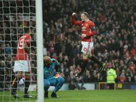Wayne Rooney inscrit son 249e but pour Man. United égalant le record de Bobby Charlton. AFP