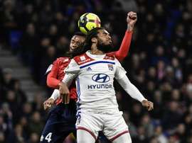 Jason Denayer titulaire avec Lyon contre Lille. AFP