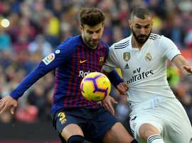 Piqué estaría en perfectas condiciones para jugar ante el Real Madrid. AFP
