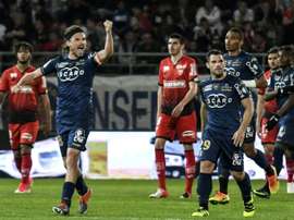 Le milieu de terrain bastiais Yannick Cahuzac fête son but contre Dijon. AFP