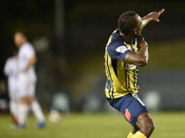 Usain Bolt, devenu footballeur, célèbre son but avec les Central Coast Mariners. AFP